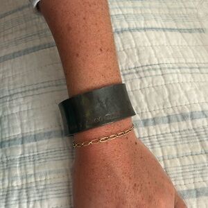 This is a silver Tiffany & Co bangle!